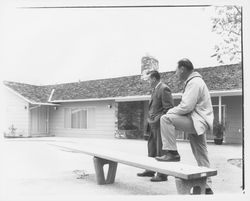 Lewis Meyers and unidentified man inspecting a Meyers built home, Santa Rosa, California, 1960 (Digital Object)