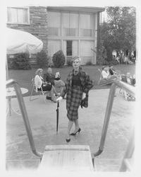 Plaid, high-waisted skirt and jacket ensemble modeled in the Dramatic Moods of Autumn Fashion Show, Santa Rosa, California, 1959 (Digital Object)