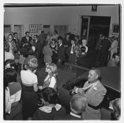 Ed Zumwalt and attendees at the Zumwalt Chrysler-Plymouth Center Open House, Santa Rosa, California, 1971 (Digital Object)