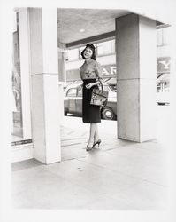 Evelyn Knutsen at entrance to The White House, Santa Rosa, California, 1959 (Digital Object)