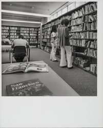 Patrons using the California Youth Authority Library at Los Guilucos (Digital Object)