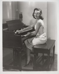 Diane Romero at the organ, Santa Rosa, California, 1957 (Digital Object)