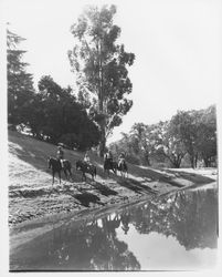 Horseback riding at near a Annie John Pond at Palomino Lakes, Cloverdale, California, 1961 (Digital Object)