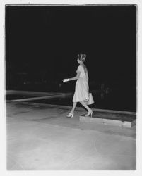 Backless evening dress modeled at the Sword of Hope fashion show at the Flamingo Hotel, Santa Rosa, California, 1960 (Digital Object)