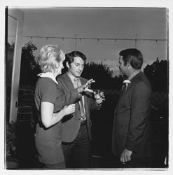 Don Zumwalt and attendees at the the Zumwalt Chrysler-Plymouth Center Open House, Santa Rosa, California, 1971 (Digital Object)