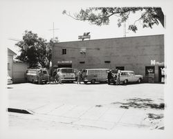 Bruner&#39;s trucks parked behind the Bruner Building, Santa Rosa, California, 1964 (Digital Object)