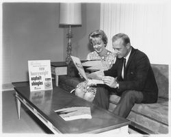 Looking at brochures and plans at Young America&#39;s Oak Lake Green subdivision, Petaluma, California, 1964 (Digital Object)