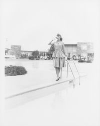 Layered top and pleated skirt modeled in the Dramatic Moods of Autumn Fashion Show, Santa Rosa, California, 1959 (Digital Object)