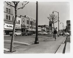 Sandy Perry walking in front of the Courthouse, Santa Rosa, California, 1959 (Digital Object)